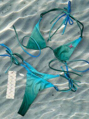 Sold on Depop
BoutineLA Mermaid micro bikini set ⭐️ mermaid blue teal & green